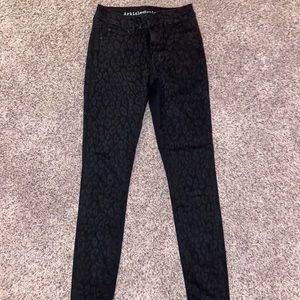 Black leopard patterned skinny jeans